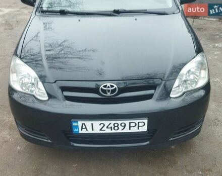 Черный Тойота Королла, объемом двигателя 1.6 л и пробегом 220 тыс. км за 5800 $, фото 1 на Automoto.ua
