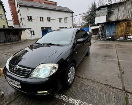 Черный Тойота Королла, объемом двигателя 1.6 л и пробегом 211 тыс. км за 6200 $, фото 1 на Automoto.ua