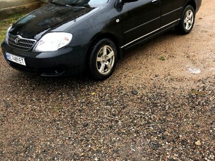 Черный Тойота Королла, объемом двигателя 1.6 л и пробегом 265 тыс. км за 3900 $, фото 1 на Automoto.ua