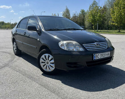 Чорний Тойота Королла, об'ємом двигуна 1.59 л та пробігом 330 тис. км за 5500 $, фото 1 на Automoto.ua