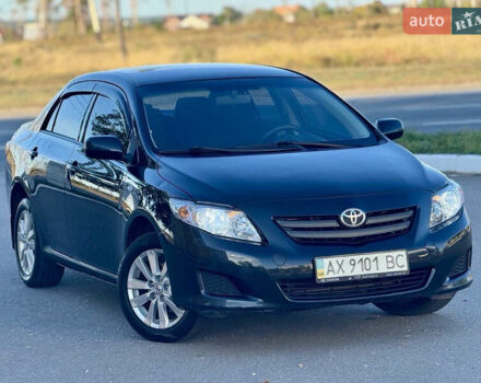 Чорний Тойота Королла, об'ємом двигуна 1.6 л та пробігом 258 тис. км за 6150 $, фото 1 на Automoto.ua