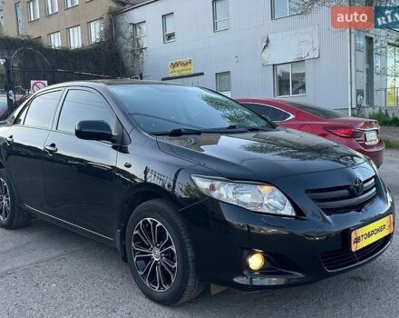 Черный Тойота Королла, объемом двигателя 1.6 л и пробегом 177 тыс. км за 6990 $, фото 1 на Automoto.ua