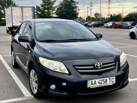 Чорний Тойота Королла, об'ємом двигуна 1.6 л та пробігом 217 тис. км за 6900 $, фото 1 на Automoto.ua