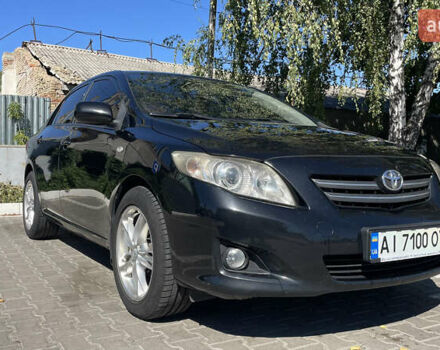 Чорний Тойота Королла, об'ємом двигуна 1.6 л та пробігом 316 тис. км за 7000 $, фото 1 на Automoto.ua