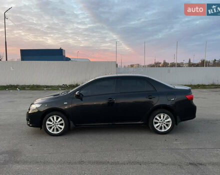 Чорний Тойота Королла, об'ємом двигуна 1.6 л та пробігом 191 тис. км за 7100 $, фото 1 на Automoto.ua