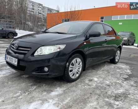 Черный Тойота Королла, объемом двигателя 1.6 л и пробегом 145 тыс. км за 7300 $, фото 1 на Automoto.ua