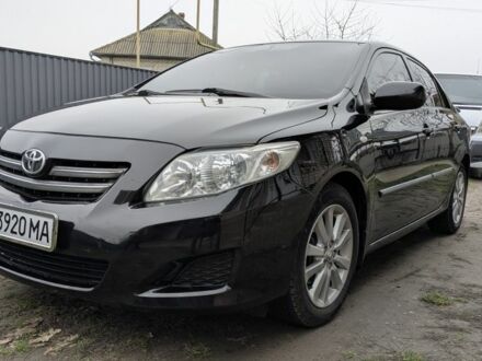 Чорний Тойота Королла, об'ємом двигуна 1.6 л та пробігом 210 тис. км за 7999 $, фото 1 на Automoto.ua