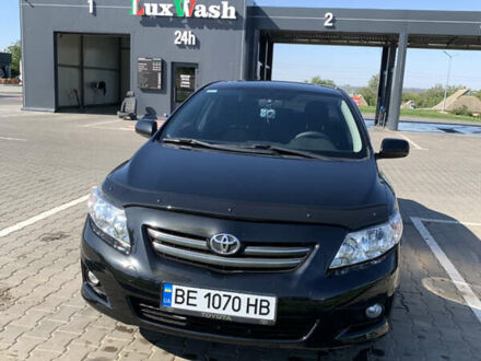 Чорний Тойота Королла, об'ємом двигуна 1.6 л та пробігом 223 тис. км за 6900 $, фото 1 на Automoto.ua