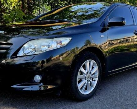 Чорний Тойота Королла, об'ємом двигуна 0 л та пробігом 56 тис. км за 9300 $, фото 1 на Automoto.ua