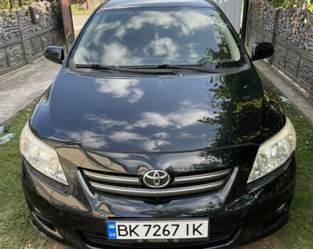 Чорний Тойота Королла, об'ємом двигуна 1.6 л та пробігом 130 тис. км за 6499 $, фото 1 на Automoto.ua