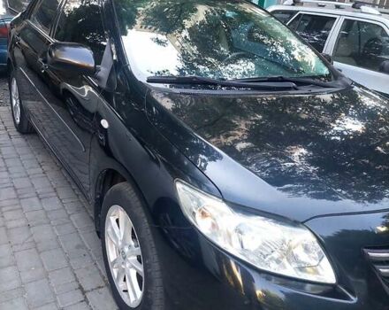 Чорний Тойота Королла, об'ємом двигуна 1.6 л та пробігом 185 тис. км за 7900 $, фото 1 на Automoto.ua