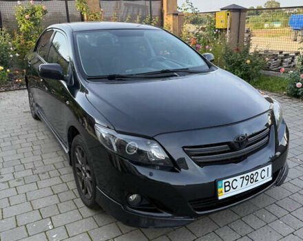 Черный Тойота Королла, объемом двигателя 1.6 л и пробегом 241 тыс. км за 6799 $, фото 1 на Automoto.ua