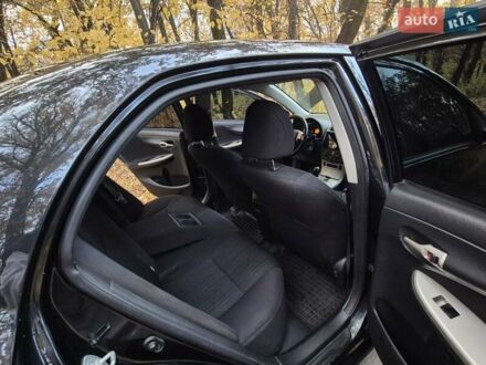 Чорний Тойота Королла, об'ємом двигуна 1.6 л та пробігом 212 тис. км за 6700 $, фото 1 на Automoto.ua