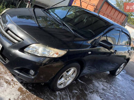 Черный Тойота Королла, объемом двигателя 1.6 л и пробегом 183 тыс. км за 7500 $, фото 1 на Automoto.ua