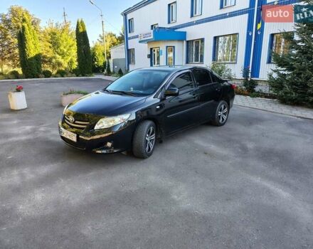 Чорний Тойота Королла, об'ємом двигуна 1.6 л та пробігом 156 тис. км за 8150 $, фото 1 на Automoto.ua