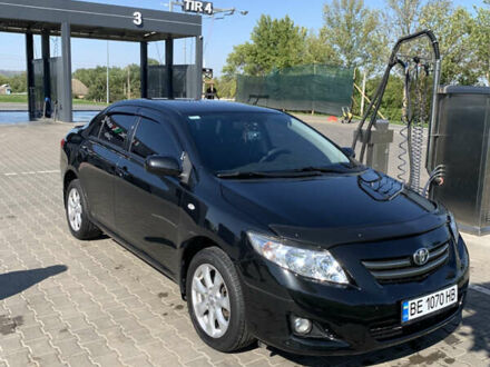 Чорний Тойота Королла, об'ємом двигуна 1.6 л та пробігом 223 тис. км за 7400 $, фото 1 на Automoto.ua