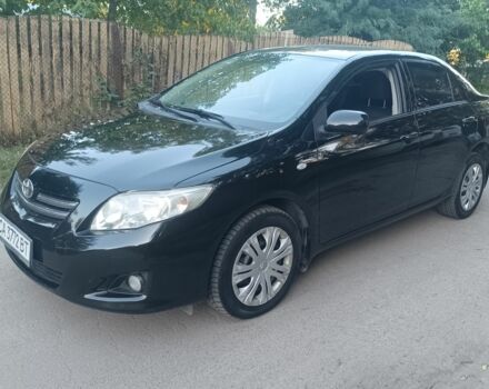 Черный Тойота Королла, объемом двигателя 1.6 л и пробегом 125 тыс. км за 5600 $, фото 1 на Automoto.ua
