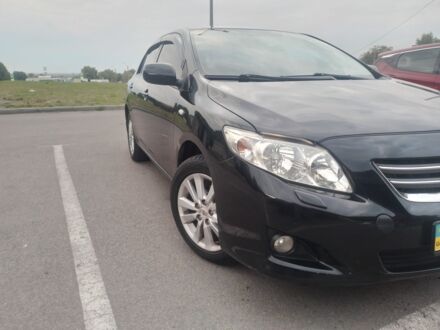 Чорний Тойота Королла, об'ємом двигуна 1.6 л та пробігом 270 тис. км за 7500 $, фото 1 на Automoto.ua