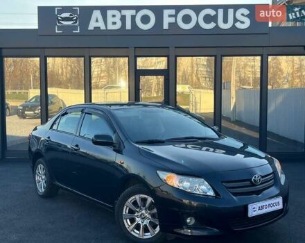 Чорний Тойота Королла, об'ємом двигуна 1.6 л та пробігом 186 тис. км за 6990 $, фото 1 на Automoto.ua