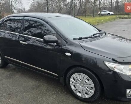 Чорний Тойота Королла, об'ємом двигуна 1.6 л та пробігом 210 тис. км за 6550 $, фото 1 на Automoto.ua