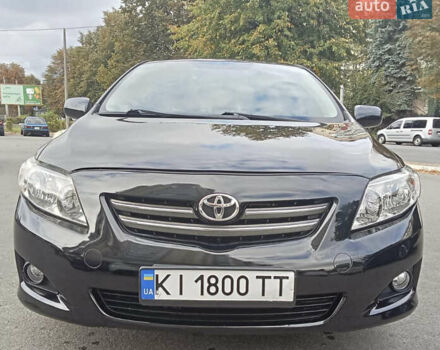 Чорний Тойота Королла, об'ємом двигуна 1.6 л та пробігом 226 тис. км за 6300 $, фото 1 на Automoto.ua