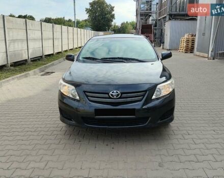 Чорний Тойота Королла, об'ємом двигуна 1.33 л та пробігом 240 тис. км за 5900 $, фото 1 на Automoto.ua