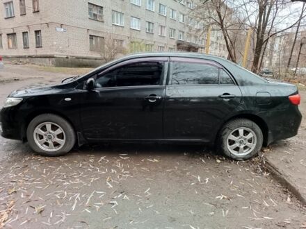Тойота Королла 2009 в Каменское - Днепродзержинск на Automoto.ua Черный Тойота Королла, объемом двигателя 1.3 л и пробегом 130 тыс. км за 6000 $, фото 1 на Automoto.ua