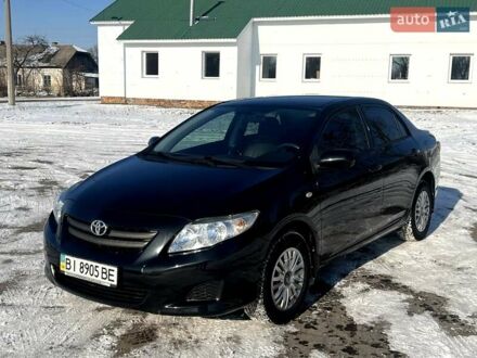 Черный Тойота Королла, объемом двигателя 1.3 л и пробегом 204 тыс. км за 6900 $, фото 1 на Automoto.ua