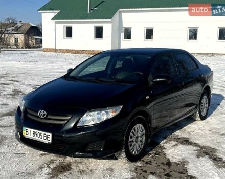 Чорний Тойота Королла, об'ємом двигуна 1.3 л та пробігом 204 тис. км за 6900 $, фото 1 на Automoto.ua