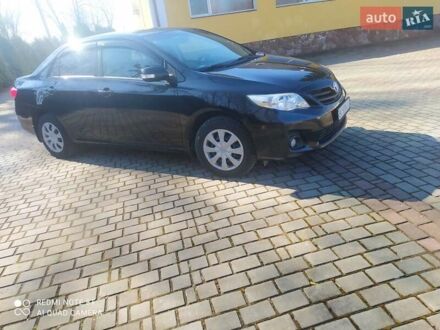 Черный Тойота Королла, объемом двигателя 1.3 л и пробегом 234 тыс. км за 7100 $, фото 1 на Automoto.ua