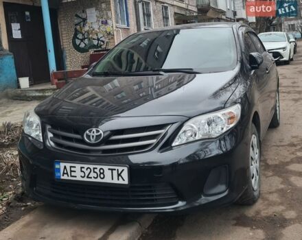 Черный Тойота Королла, объемом двигателя 1.33 л и пробегом 269 тыс. км за 7200 $, фото 1 на Automoto.ua