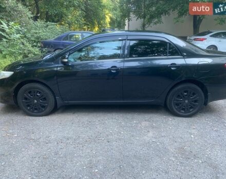 Черный Тойота Королла, объемом двигателя 1.6 л и пробегом 175 тыс. км за 9300 $, фото 1 на Automoto.ua