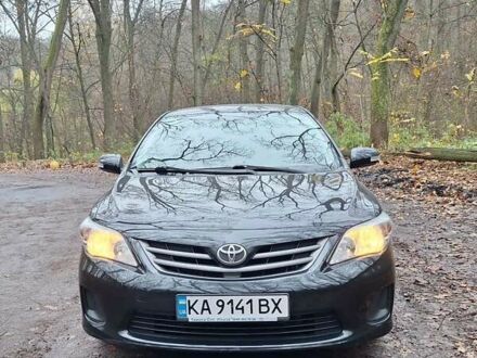 Черный Тойота Королла, объемом двигателя 1.33 л и пробегом 119 тыс. км за 8000 $, фото 1 на Automoto.ua