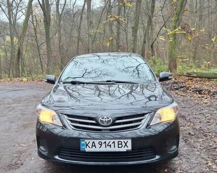 Черный Тойота Королла, объемом двигателя 1.33 л и пробегом 119 тыс. км за 8000 $, фото 1 на Automoto.ua