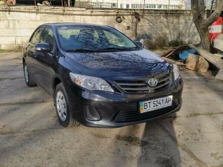 Чорний Тойота Королла, об'ємом двигуна 1.3 л та пробігом 84 тис. км за 8000 $, фото 1 на Automoto.ua