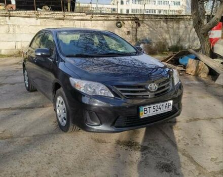 Черный Тойота Королла, объемом двигателя 1.3 л и пробегом 84 тыс. км за 8000 $, фото 1 на Automoto.ua