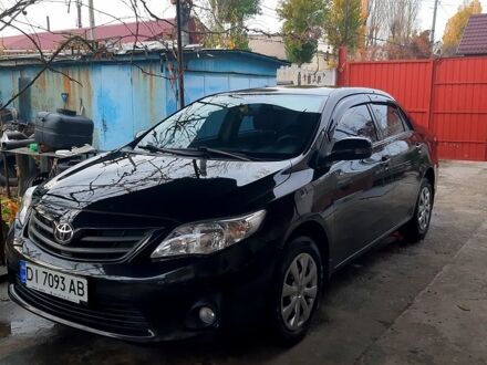 Черный Тойота Королла, объемом двигателя 1.3 л и пробегом 98 тыс. км за 8700 $, фото 1 на Automoto.ua