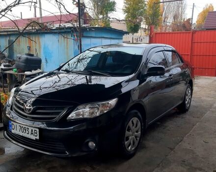 Черный Тойота Королла, объемом двигателя 1.3 л и пробегом 98 тыс. км за 8700 $, фото 1 на Automoto.ua