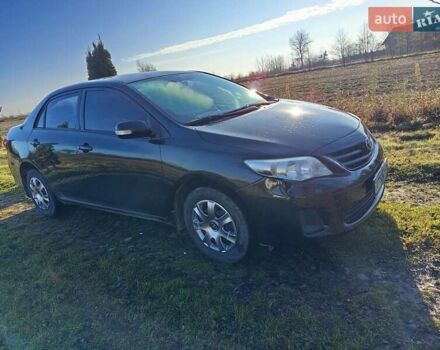 Черный Тойота Королла, объемом двигателя 1.3 л и пробегом 224 тыс. км за 6200 $, фото 1 на Automoto.ua