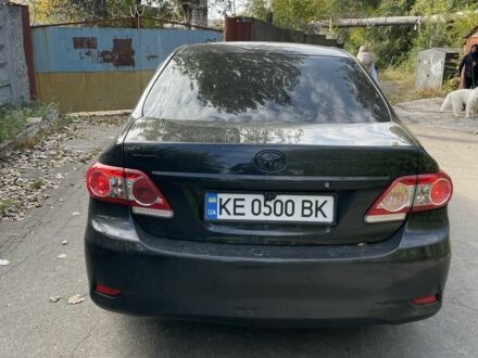 Черный Тойота Королла, объемом двигателя 1.3 л и пробегом 228 тыс. км за 7200 $, фото 1 на Automoto.ua