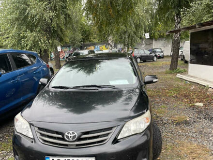 Чорний Тойота Королла, об'ємом двигуна 1.6 л та пробігом 250 тис. км за 8500 $, фото 1 на Automoto.ua