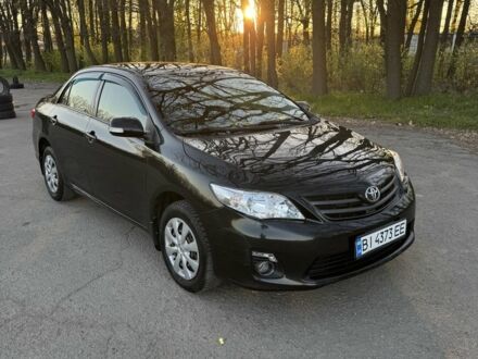 Тойота Королла 2011 у Умани на Automoto.ua Чорний Тойота Королла, об'ємом двигуна 1.3 л та пробігом 84 тис. км за 6900 $, фото 1 на Automoto.ua