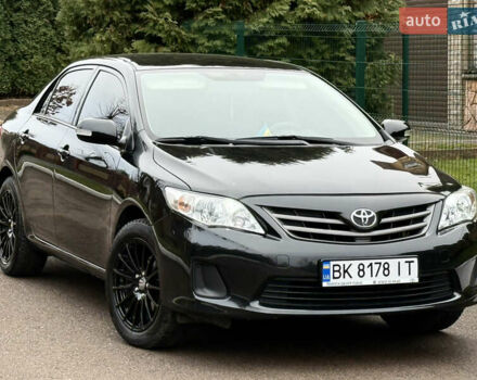 Черный Тойота Королла, объемом двигателя 1.4 л и пробегом 235 тыс. км за 7350 $, фото 1 на Automoto.ua