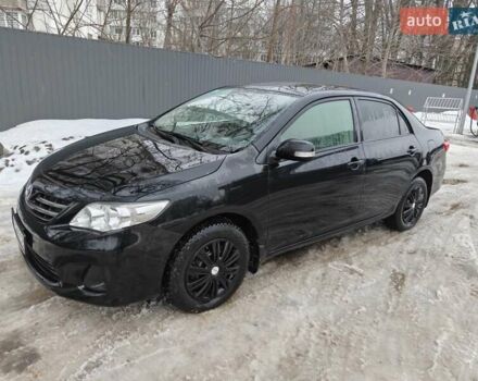 Черный Тойота Королла, объемом двигателя 1.6 л и пробегом 110 тыс. км за 9200 $, фото 1 на Automoto.ua