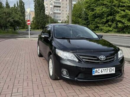 Чорний Тойота Королла, об'ємом двигуна 1.33 л та пробігом 238 тис. км за 9500 $, фото 1 на Automoto.ua
