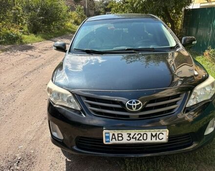 Чорний Тойота Королла, об'ємом двигуна 1.33 л та пробігом 231 тис. км за 6100 $, фото 1 на Automoto.ua