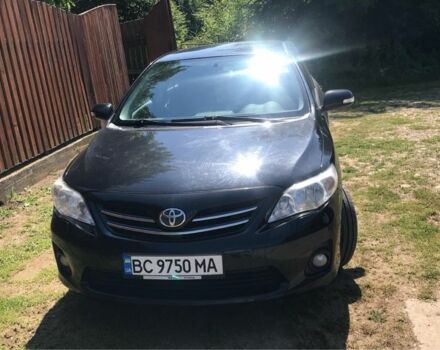 Черный Тойота Королла, объемом двигателя 1.6 л и пробегом 180 тыс. км за 8300 $, фото 1 на Automoto.ua