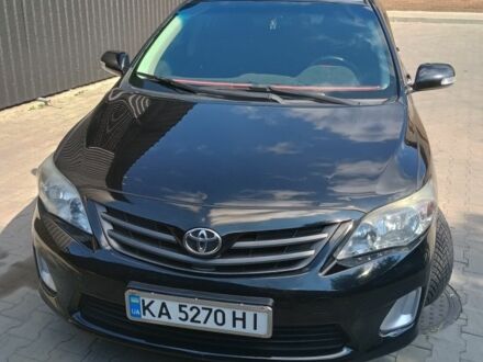 Черный Тойота Королла, объемом двигателя 1.3 л и пробегом 210 тыс. км за 6470 $, фото 1 на Automoto.ua