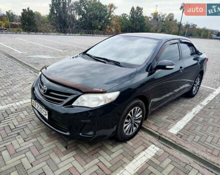 Черный Тойота Королла, объемом двигателя 1.3 л и пробегом 172 тыс. км за 9000 $, фото 1 на Automoto.ua