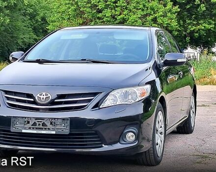 Черный Тойота Королла, объемом двигателя 1.6 л и пробегом 83 тыс. км за 9400 $, фото 1 на Automoto.ua